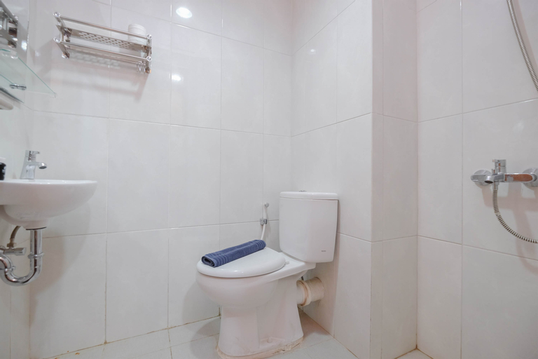 Bedroom 1, Minimalist and Comfortable Studio at Evenciio Margonda Apartment By Travelio, Depok