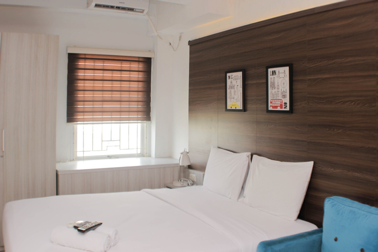 Cozy Stay and Tranquil Studio Patraland Urbano Apartment By Travelio, Bekasi