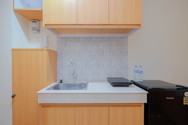 Dining Room, Minimalist and Comfortable Studio at Evenciio Margonda Apartment By Travelio, Depok