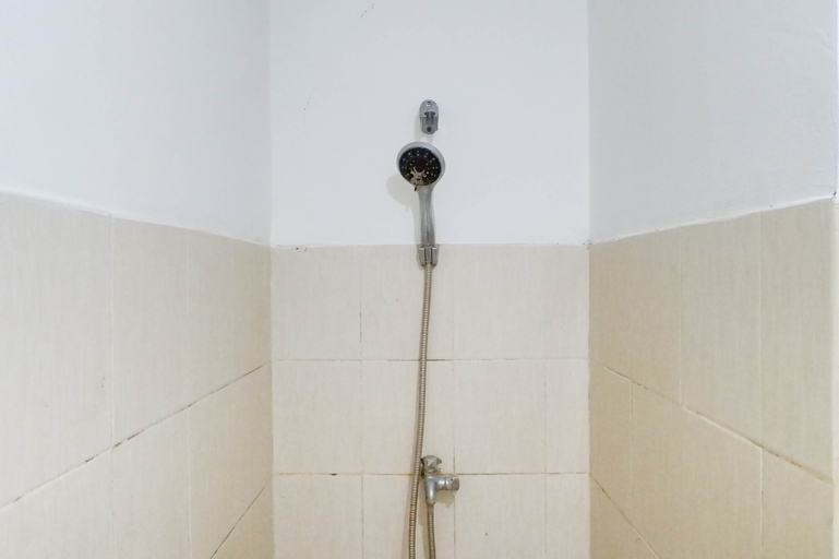 Bedroom 4, Simply Cozy Studio Apartment at Puncak Kertajaya By Travelio, Surabaya