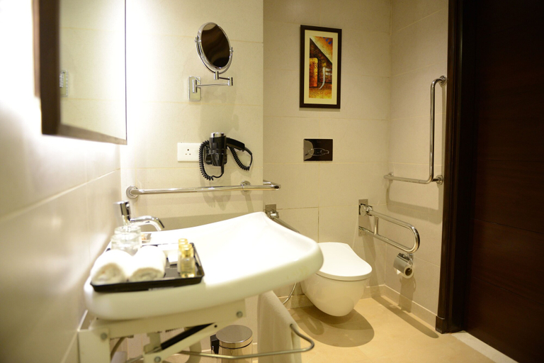 Bathroom 4, Gurmon Hotels Sohna Road Gurugram, a member of Radisson Individuals, Gurgaon