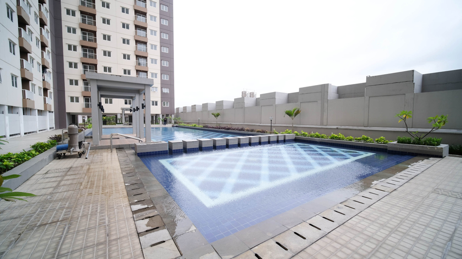 Sport & Beauty 4, Best Choice and Tidy 2BR at Puncak Dharmahusada Apartment By Travelio, Surabaya