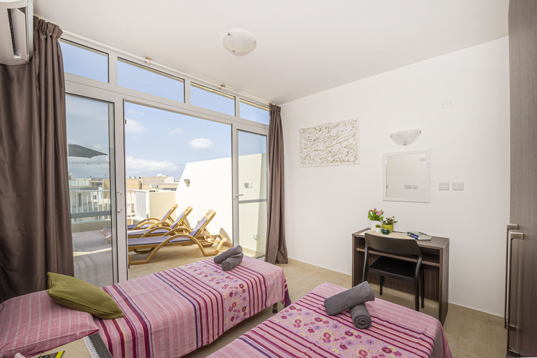 Bedroom 3, Summer Breeze Penthouse with large Terrace and Hot Tub by Getaways Malta