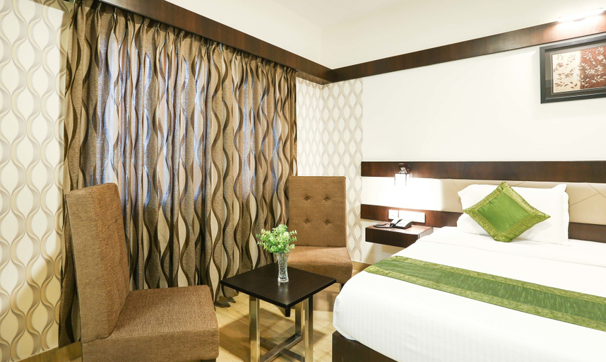 Bedroom 4, Treebo Premium Askhaya Mahal Inn, Mysore