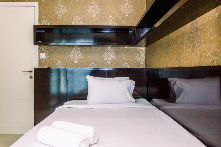 Cozy Stay and Tidy 2BR Apartment Casa Grande Residence By Travelio, South Jakarta