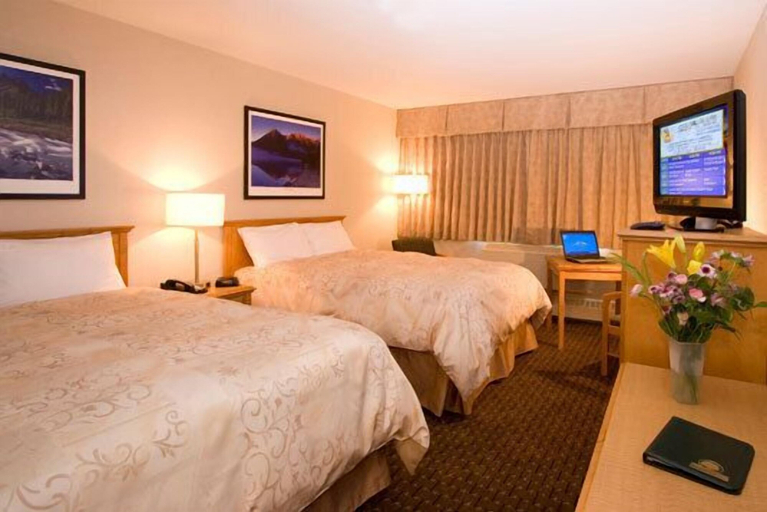 Bedroom 3, Woodlands Inn & Suites, Northern Rockies