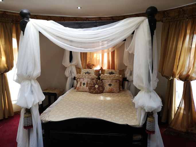 Bedroom 2, Excalibur Boutique Hotel, Bojanala