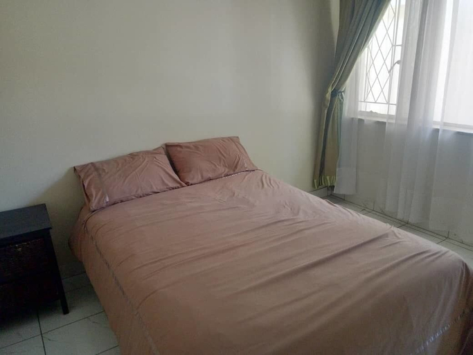 Bedroom 2, Gina's Home, Harare
