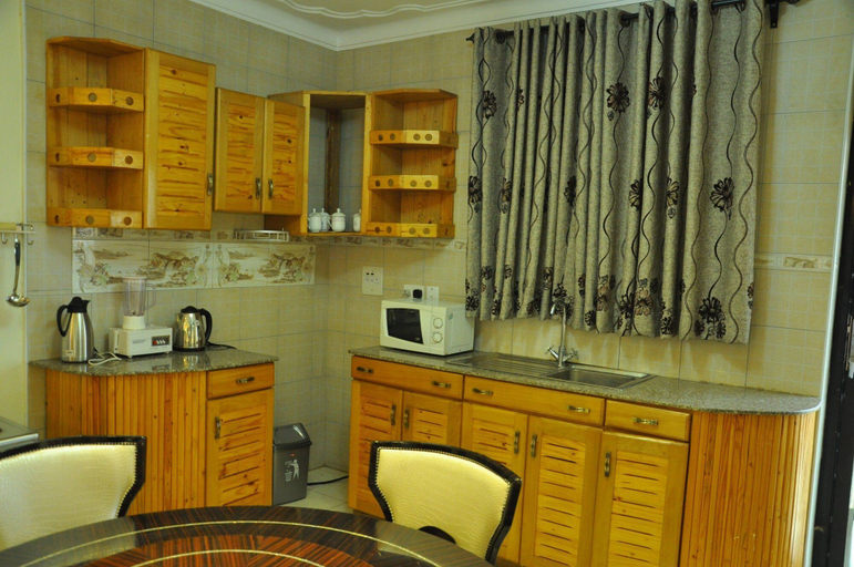 Others 5, Evelyn Apartments, Kampala