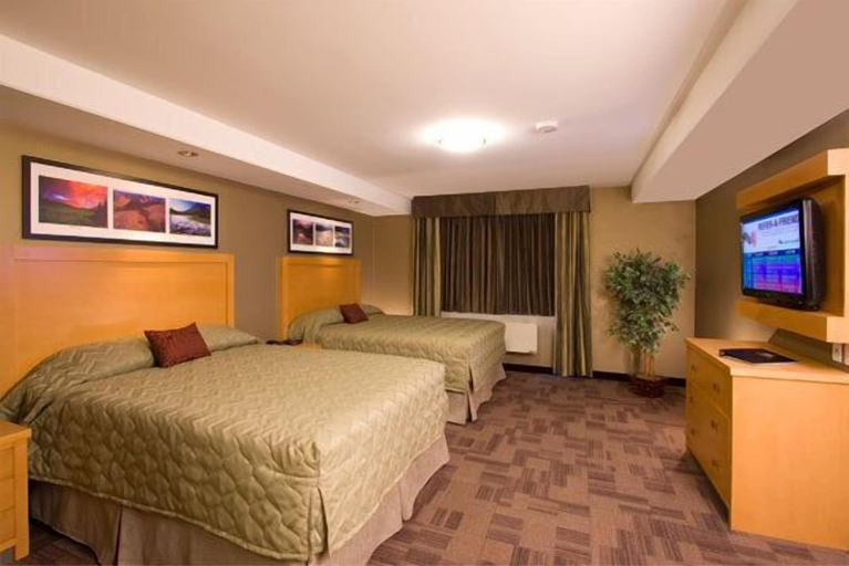Bedroom 3, Woodlands Inn & Suites, Northern Rockies
