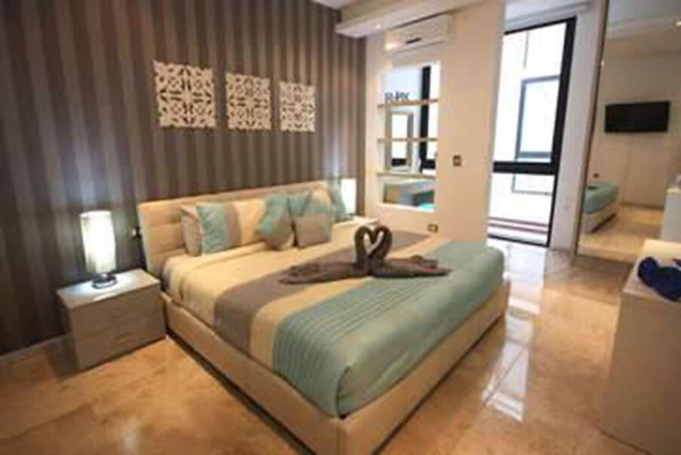 Room 2, Menesse 0TB 103-104, Cozumel