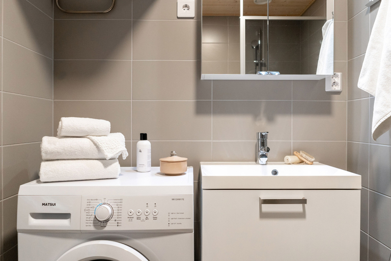 Bathroom, Bright studio by Logomo & Train station, Finland Proper