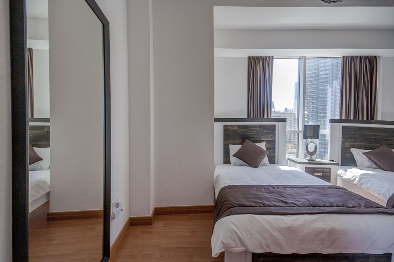Bedroom 3, The Waves by Deluxe Holiday Homes, Dubai