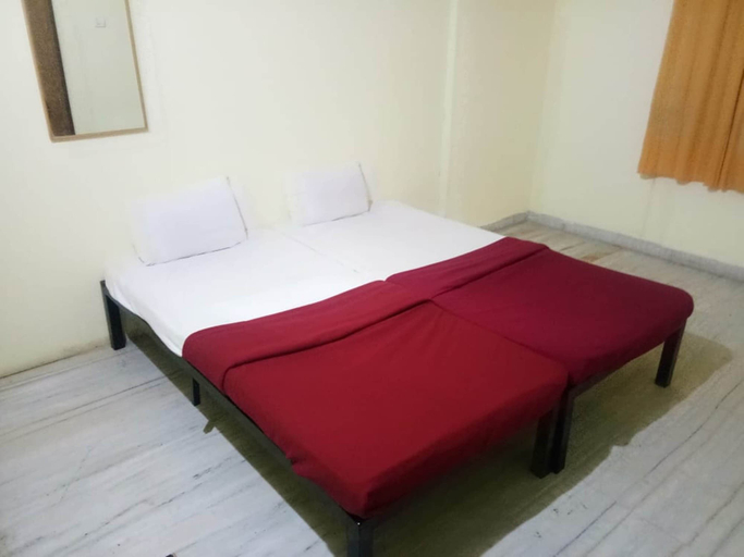 Bedroom 3, Arjun Pride Hotel, Pune