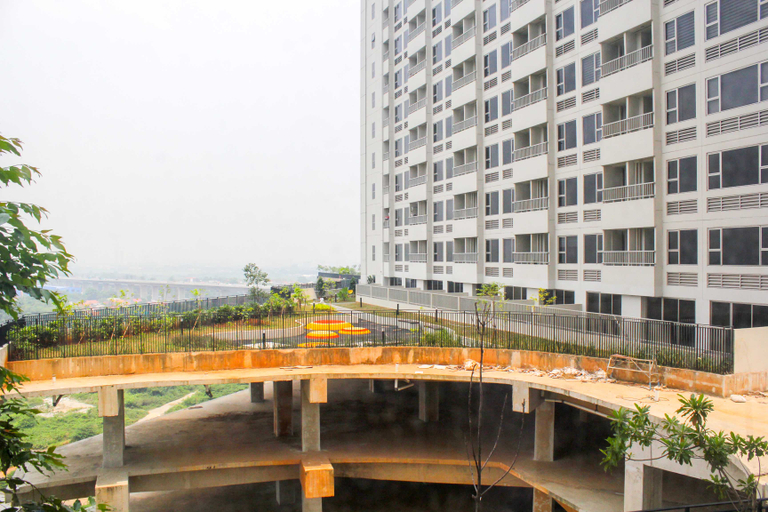 Exterior & Views, Cozy Studio at Orange County Apartment By Travelio, Cikarang