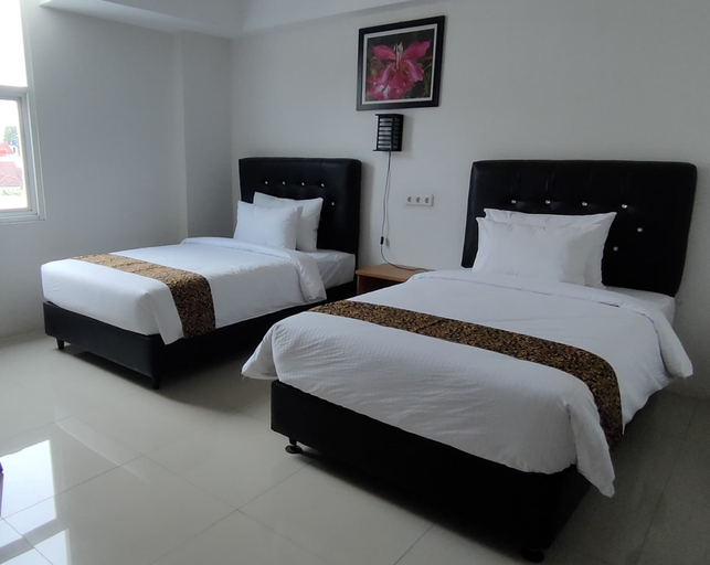 Bedroom 3, Golden Ganesha Hotel Yogyakarta by Ecommerceloka, Bantul