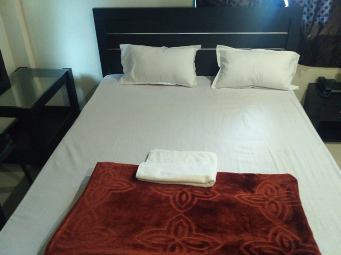 Bedroom 3, Hotel Honey Lodging, Pune