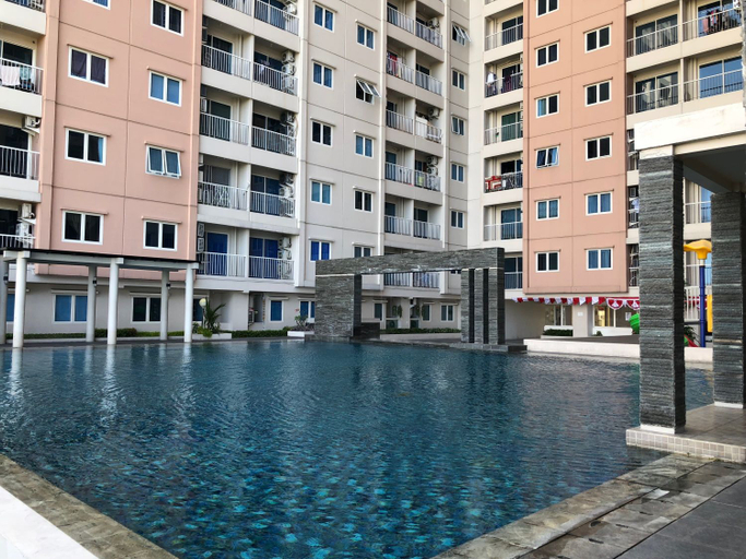 Exterior & Views, Cozy 2BR Apartment at Puncak Bukit Golf By Travelio, Surabaya