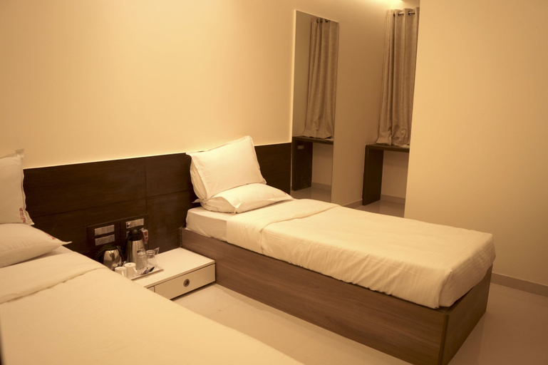 Bedroom 3, Hotel Shivam, Pune
