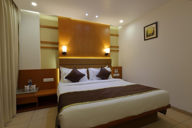 Bedroom 4, Hotel Pragati The Grand, Ahmadabad