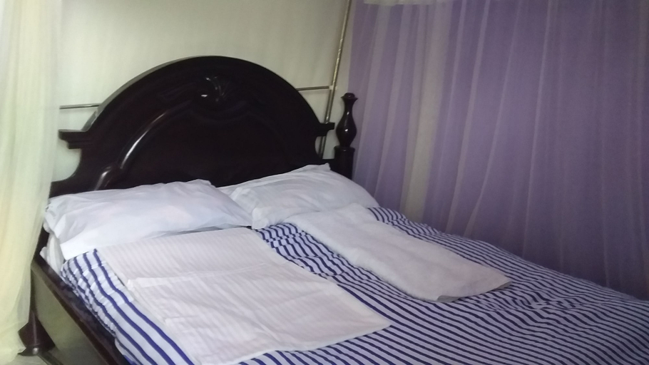 Bedroom 2, Ryan Green and Gardens Hotel, Sheema