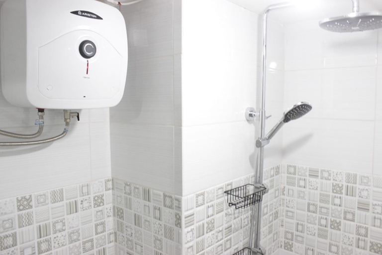 Bathroom 5, Spacious and Modern Studio Room Apartment at Grand Asia Afrika By Travelio, Bandung