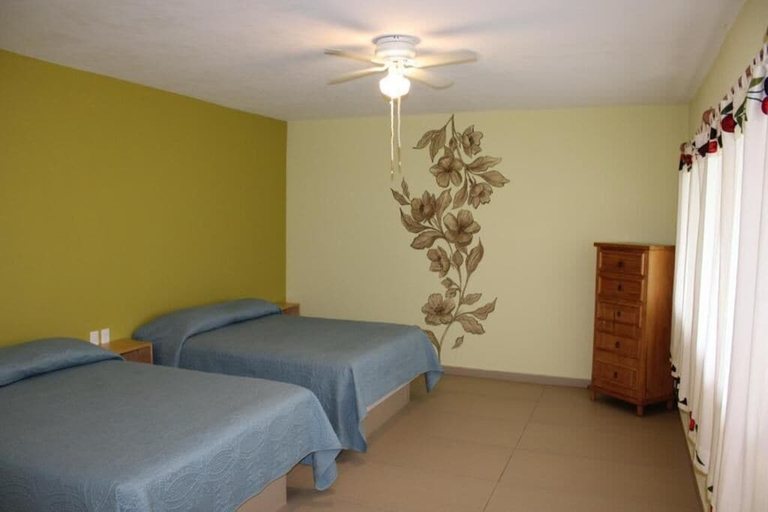 Bedroom 4, Artesanos 11 by Rotamundos, Tepoztlán