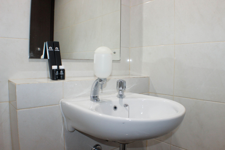 Bedroom 5, Minimalist and Cozy Studio at Grand Dhika City Bekasi Apartment By Travelio, Bekasi