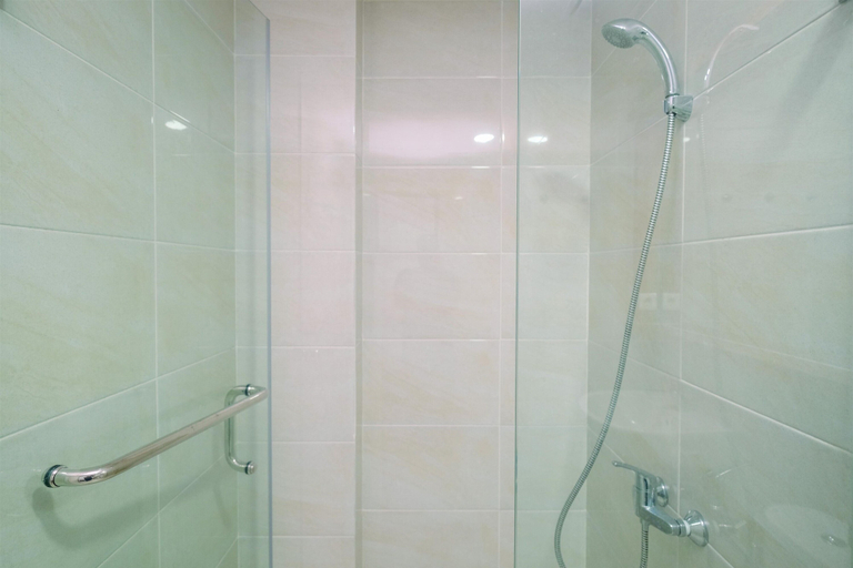Bathroom 5, Chic and Cozy 1BR Apartment at Mustika Golf Residence By Travelio, Cikarang