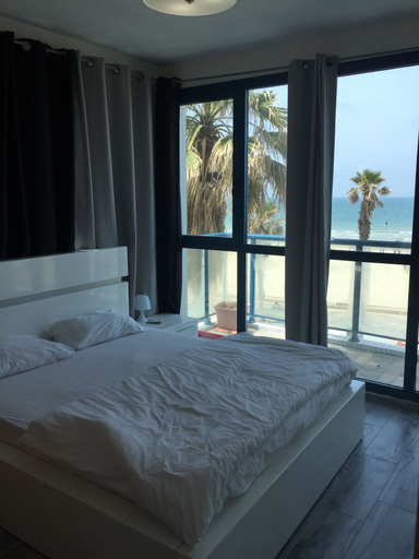 Bedroom 4, The Sea Apartments Tel Aviv by different locations