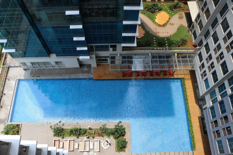 Outdoor pool, Elegant And Comfy Studio At Tamansari Iswara Apartment, Bekasi