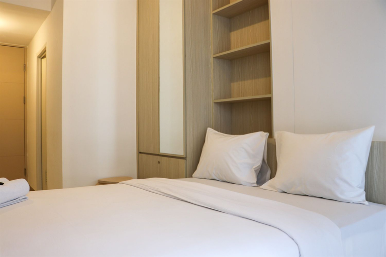 Bedroom 3, Relaxing and Comfy Studio at Tokyo Riverside PIK 2 Apartment By Travelio, Tangerang
