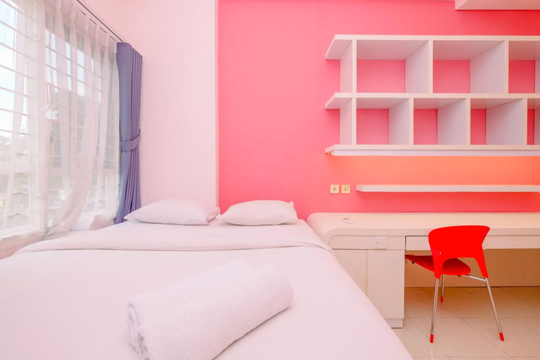 Bedroom 1, Comfort and Minimalist 2BR at Taman Melati Margonda Apartment By Travelio, Depok