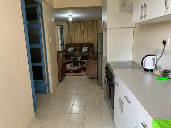Private kitchen 4, Remarkable 2-bed Apartment, Cozy and Comfortable, Kiambu