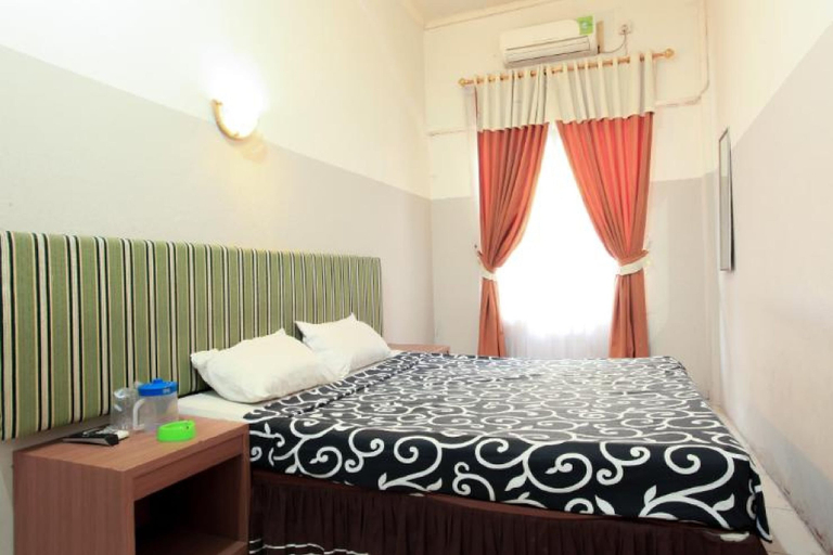 Bedroom 1, SPOT ON 2287 Akasia Hotel Syariah, Pekanbaru