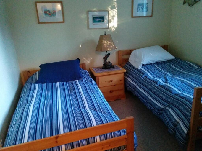 Bedroom 3, Salty Towers Oceanfront Cottages, Capital
