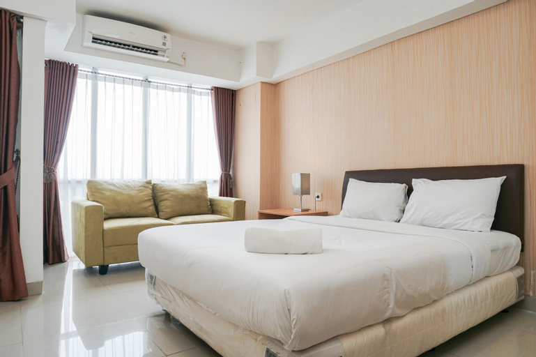 Modern Look and Homey 1BR Signature Park Grande Apartment By Travelio, Jakarta Timur