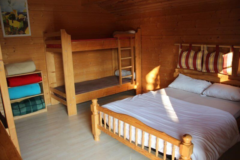 Bedroom 3, Chalets Etape du Camping Le Bivouac, Jura