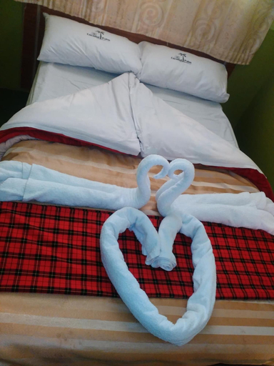 Bedroom 2, Coconut Palm Hotel, Kieni