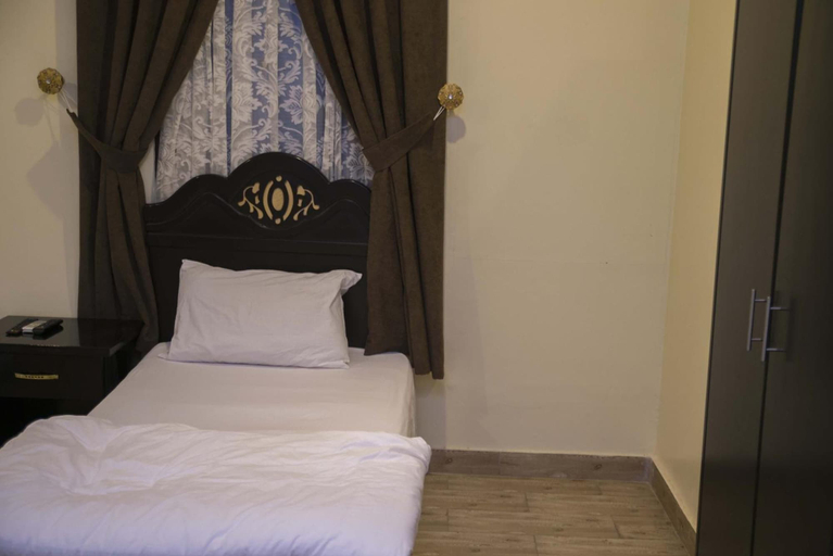 Bedroom 3, Al Eairy Serviced Apartments Company is a one-person company