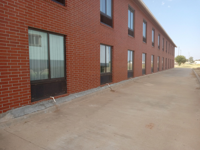 Exterior & Views 2, Days Inn by Wyndham Alva, Woods