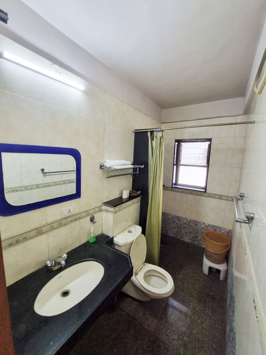 Bathroom 4, Hotel Raviraj, Pune