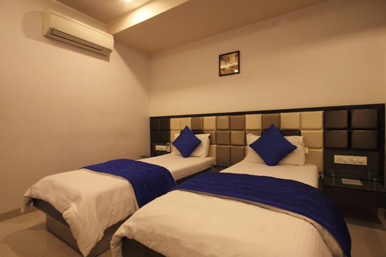 Bedroom 3, Hotel Flair Inn, Ahmadabad