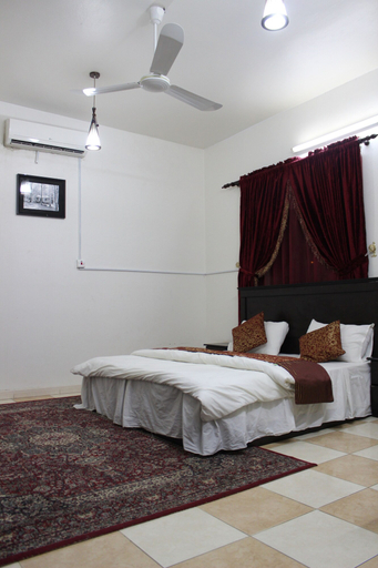 Bedroom 3, Al Eairy Serviced Apartments Company is a one-person company 4