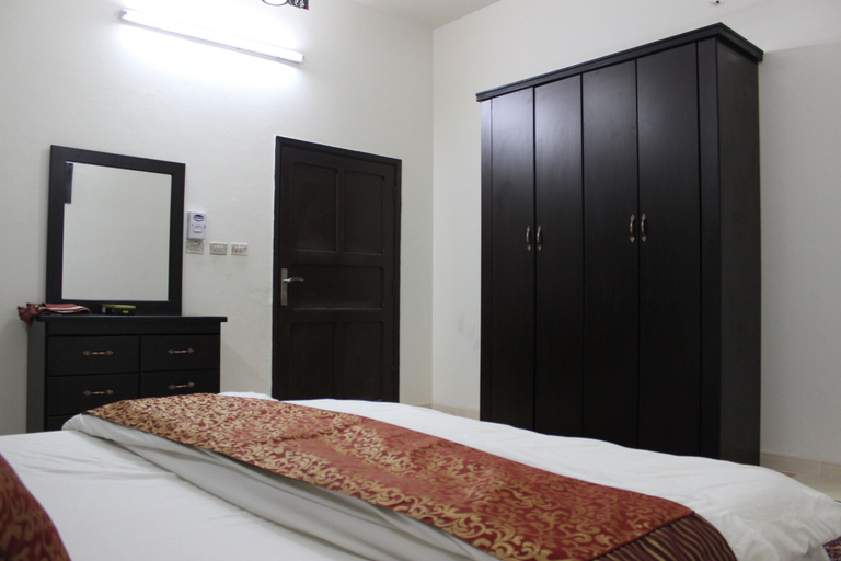 Bedroom 4, Al Eairy Serviced Apartments Company is a one-person company 4