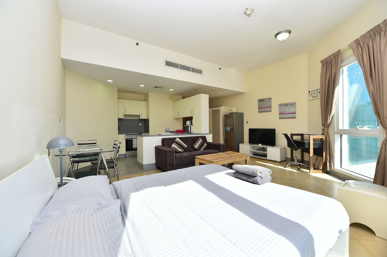 Living area 2, Alia -Bright furnished studio near metro, Dubai