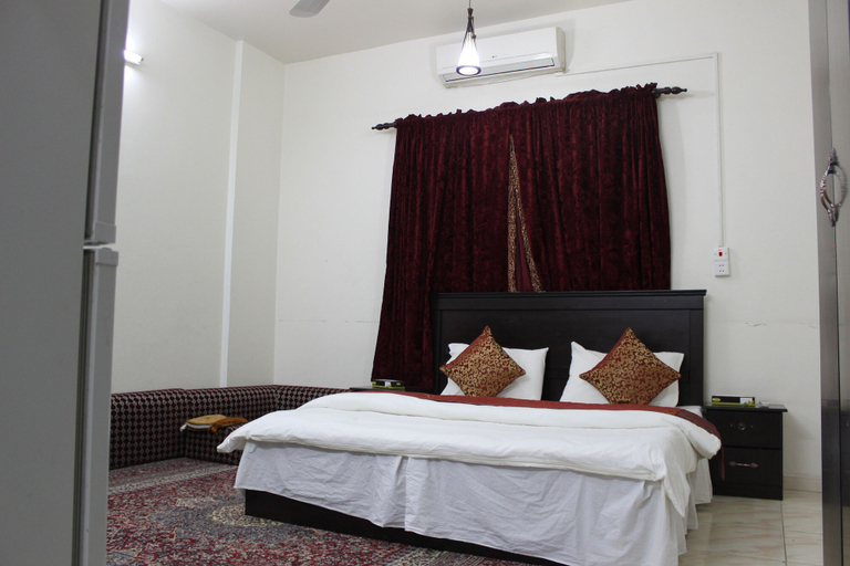 Bedroom 4, Al Eairy Serviced Apartments Company is a one-person company 4