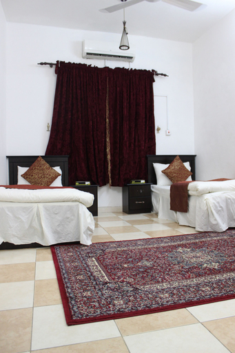 Bedroom 2, Al Eairy Serviced Apartments Company is a one-person company 4