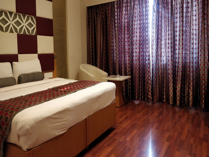 Bedroom 2, The President Hotel, Dharwad
