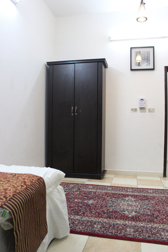 Bedroom 4, Al Eairy Serviced Apartments Company is a one-person company 4